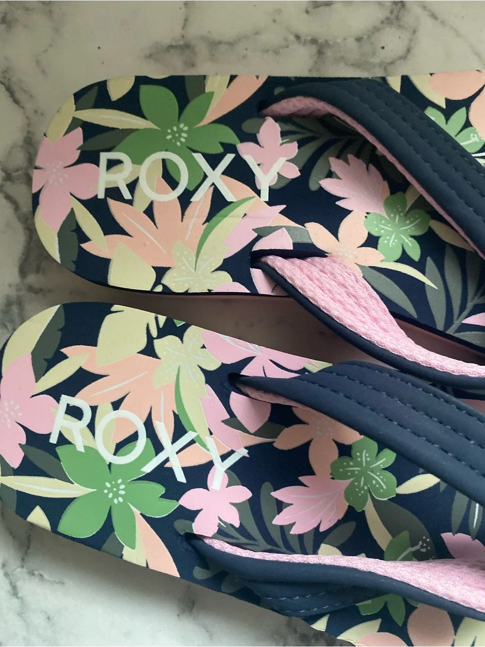 Roxy Girls' Floral Navy Flip Flops with Pink & Green Accents
